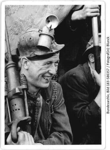 Bergarbeiter mit Bohrer
